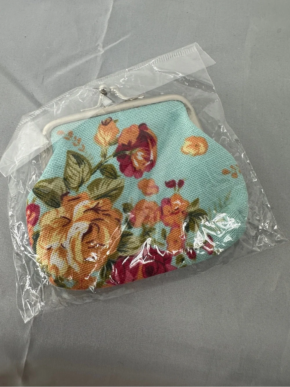 New turquoise floral coin pouch